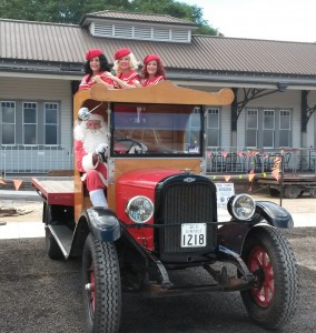 The DooWop Dolls on the back and Santa driving the Chev truck. 